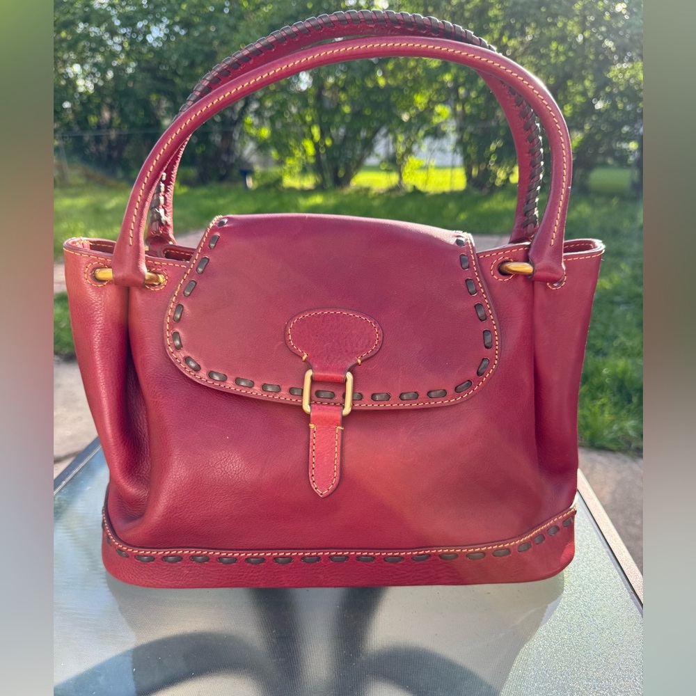 Dooney & Bourke leather Florentine Bordeaux flap satchel